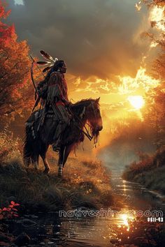 a native american man riding on the back of a horse next to a river at sunset