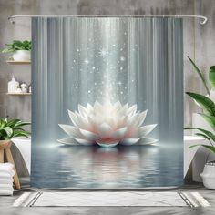 a shower curtain with a white lotus flower on the water and stars in the sky