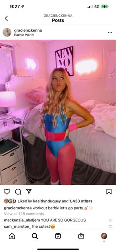 a woman in a blue and pink bodysuit standing next to a bed with her hands on her hips