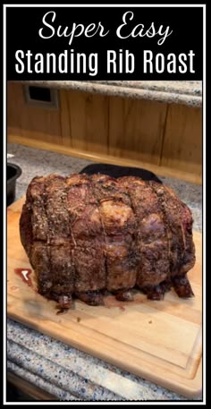 a large piece of meat sitting on top of a wooden cutting board