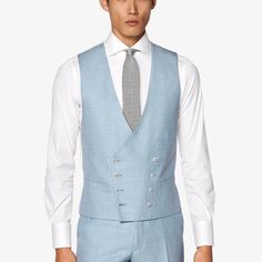 This double-breasted light blue waistcoat is tailored slim with a rear adjustment strap from a wool-silk-linen blend by Italy's E.Thomas mill. Elegant Slim Fit Vest For Spring, Spring Fitted Double Breasted Business Suit, Spring Tailored Sleeveless Suit, Elegant Fitted Double-breasted Vest, Blue Double Breasted Suit For Spring Formal, Fitted Double Breasted Blue Suit For Spring, Blue Fitted Double Breasted Suit For Spring, Classic Sleeveless Spring Suits, Elegant Double-breasted Formal Vest