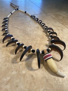 "This item is Proudly Native American Made and will come with a Certificate of Authenticity stating my enrollment and clan information. I am also a member of the Native American Arts & Craft Association. Portions of each sale go to my local community, tribe etc. This is made with a high quality resin black Bear claws and teeth. These are the best reproductions I can find. Sadly Reproductions are actually MORE expensive than my real claws and teeth. claws and teeth. This is the necklace you w Xr Aesthetic, Bear Claw Necklace, Indian Clubs, Rustic Log Furniture, Aboriginal Culture, Claw Necklace, Bear Claw, Liminal Space, Native American Crafts