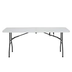 a white rectangular table with black legs on a white background, viewed from the side