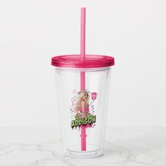 a plastic cup with a pink lid and straw in the shape of a barbie doll