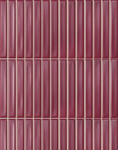 a red tile wall with vertical lines on it