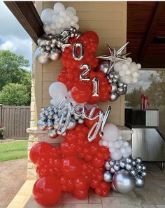 balloons are arranged in the shape of letters and numbers