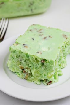 a piece of cake sitting on top of a white plate