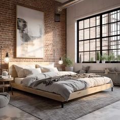 a large bed sitting in the middle of a bedroom next to a brick wall and windows