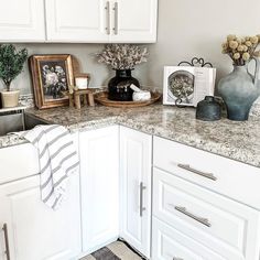 the kitchen counter is clean and ready to be used as a place for pictures or other items