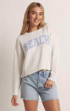 Women's Oversized Sweater Beach Sweater Life's a beach, especially when she's wearing the new Beach Sweater! Made in a Loop Texture Yarn, this oversized crew neck sweater is ready for adventures, particularly ones that take place near the beach! Shop more from Z Supply here. Details Available in sizes: XS-L Available in colors: Violet Haze and Orange Cream 'Beach' written across the front Loop texture yarn Crew neckline Long sleeve Fabric 85% Cotton and 25% Nylon Sizing XSmall: 0/2, Small: 2/4, Tyvek Bags, Beach Sweater, Oversized Sweater Women, Textured Yarn, Orange Cream, Chunky Sweater, Getting Cozy, Oversized Sweater, Matching Dresses