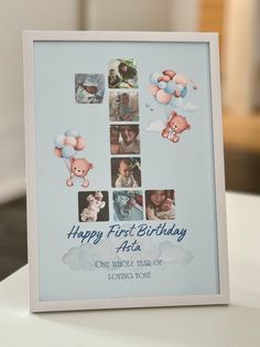 a blue first birthday card with pictures of babys and teddy bears on it, sitting on a table