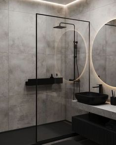 a bathroom with a sink, mirror and shower in it