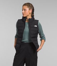 We’ve updated the fan-favorite Women’s Aconcagua line to include 100% recycled body fabric on the outside, and a combination of fully recycled 600-fill down and synthetic insulation on the inside. The Women’s Aconcagua 3 Vest provides the core warmth you need, with unrestricted mobility. Women's Women's Vests [North Face, Northface, thenorthface, the northface, TNF, tnf] North Face Vest, Outerwear Vest, Black North Face, Down Vest, Polyester Top, Sleeveless Vest, North Face Women, Womens Vest, Vest Jacket