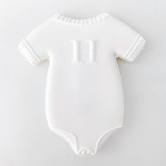 a white bodysuit with the letter h on it's chest is displayed against a white background