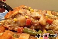 a close up of a plate of food with meat and veggies