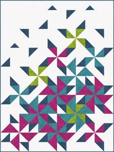 an abstract quilt with many different colored triangles