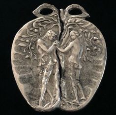 an old silver coin with two people on it's side and one is holding the other