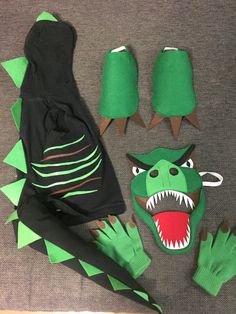 an assortment of green and black halloween costumes