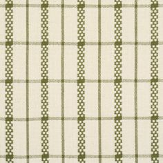 a green and white checkered fabric with small stitchs on the side, as well as