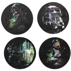 four black plates with different designs on them, each featuring a star wars character in the center