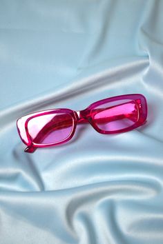 Elevate your style with our Hot Pink Square Sunglasses. These vintage-inspired shades feature a bold square shape, perfect for making a statement. Bringing retro vibes from the 2000s, these sunglasses are the ultimate bubble gum pop music video accessory. Content + Care - Plastic/Metal - Wipe Clean - Unisex Hot Pink Sunglasses, Pink Square, Pink Retro, Pink Sunglasses, The 2000s, Video Accessories, Retro Vibe, Square Shape, Pop Music