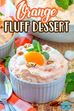 an orange fluff dessert in a white bowl on top of a checkered table cloth