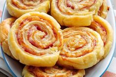 a plate filled with pastries sitting on top of a table