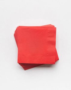 two red napkins sitting on top of each other