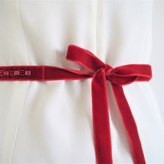 Add a gorgeous flash of colour to your wedding dress or bridesmaid dress with my handmade velvet sash belt. This luxurious bridal sash features hand-stitched beads on sumptuous velvet and is perfect for weddings with a red, Art Deco or retro theme. I love the glass bugle beads used in this design and the subtle Art Deco feel. It works beautifully for brides and bridesmaids and is a lovely way to accentuate the waistline of your dress. The striking, rich red looks gorgeous against ivory or white- Bridal Belt Ribbon, Red Sash Belt, Pink Sashes Bridal Belt For Wedding, Bridal Belts And Sashes Fabric, Luxury Elegant Red Belt, Red Art Deco, Women's Sash, Belt Wedding Dress, December 2nd