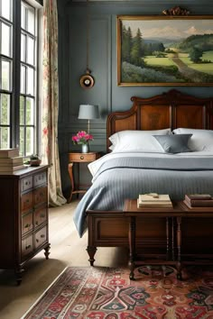 a bedroom with a large painting on the wall next to a bed and two nightstands