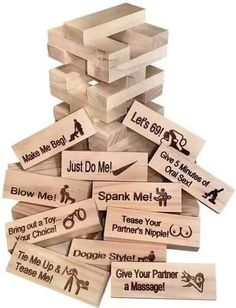 a pile of wooden blocks with words on them