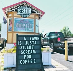 a sign that is in front of a coffee shop