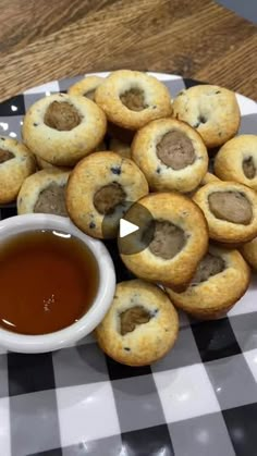 a plate full of cookies and dipping sauce