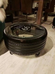 a coffee table made out of an old tire