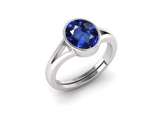 a ring with a blue stone in the center