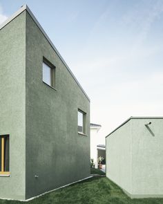 the house is shaped like a cube and has two windows on each side that are open to let in light