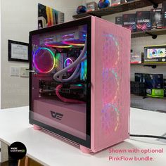 a pink computer case sitting on top of a table