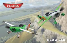 two planes are flying in the sky over some hills and trees, one is green and white