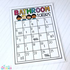 a printable bathroom calendar with three kids on it