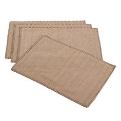 three placemats made out of jute fabric on a white background with copy space