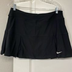 Women’s Nike Tennis/Golf Skirt Nwt. Black. Size L Measurements Waist 16-1/2” Length 14” Black Pleated Tennis Skirt For Sports, Sports Black Pleated Skort, Sporty Black Tennis Skort, Sporty Black Skort For Tennis, Black Mini Skirt For Sports, Spring Season, Fitted Black Tennis Bottoms, Casual Nike Tennis Skirt, Sporty Black Tennis Skirt, Black Sporty Tennis Skirt