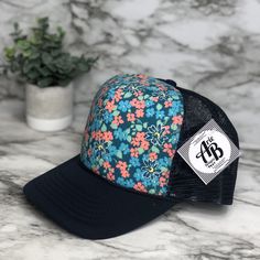 "These unique custom MADE TO ORDER hats are truely one of a kind. Not all heads are created equal , which is why we have so many size options. You can customize your hat color, size and your favorite design. please note all hat colors vary by size, in other words- not every hat color is available in every size. **please note these are made to order and the design layouts will be unique to each hat ordered** Please feel free to ask any questions you have about sizing, as these are MADE TO ORDER e Customizable Blue Hats One Size Fits Most, Cute Snapback Hat With Curved Bill One Size, Cute Snapback Hat With Curved Bill, Trucker Baseball Cap With Curved Bill As Gift, Green Curved Brim Hat As Gift, Casual Multicolor Customizable Hats, Fun Adjustable Flat Bill Hat, Custom Curved Brim Hat As Gift, Trucker Hat As A Gift