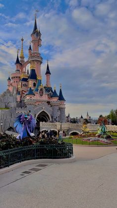 the entrance to sleeping beauty castle at disneyland world