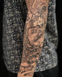 a person with a tattoo on their arm