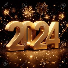 golden numbers and fireworks against a black background with gold confetti stock photo - 1227