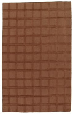 a brown rug with squares on it