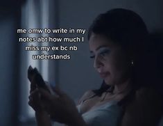 a woman holding a cell phone in her hand with a quote on the screen that reads, me only to write in my notes about how much i miss my ex