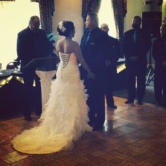 the bride and groom are getting ready to walk down the aisle