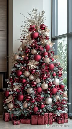 a christmas tree with red and gold ornaments