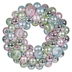 a wreath made out of ornaments on a white background